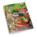 Titelbild der Zeitschrift „meine gute Landküche“ mit grün-gelbem Schriftzug und Untertitel „Ländlicher Genuss & regionale Vielfalt“. In der Mitte eine rote Auflaufform mit Gemüse-Quiche vor frischen Tomaten und Kräutern, Schriftzug „Genießen im Sommer“. Linke Spalte mit Fotos von Gerichten wie Focaccia, Steaks und Kuchen. Weitere Texte: „Hausgemacht schmeckt’s am besten!“ und „Köstliche Ideen mit heimischem Gemüse“.