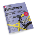 Magazincover der Ausgabe „Finanzen“ von Stiftung Warentest mit hellviolettem Hintergrund. Titelthemen u. a.: „Top-Schutz für Ihr Rad“, „Börsenturbulenzen“, „Steuern für Rentner“, „Modernisierung mit Bausparvertrag“. Rechts unten ein gelbes Fahrrad mit Sattel, Schloss und Rückrad in Nahaufnahme, daneben roter Kreis mit weißer Schrift: „Plus: Die besten Fahrradschlösser“.