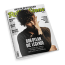 Titelbild der Zeitschrift „Rolling Stone Germany“ mit farbigem Logo oben mittig, im Zentrum eine androgyne Person mit dunklen Locken in zerschlissener schwarzer Kleidung, die mit einer Hand das Gesicht teilweise bedeckt; Hauptüberschrift: „BOB DYLAN, DIE LEGENDE“, Unterzeile: „Das Biopic des Jahres: Timothée Chalamet über seine Verwandlung“, weitere Themen links und rechts außen gelistet, weißer Hintergrund.