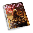 Magazin mit dem Titel „GOODLIFE WOHN-DESIGN“, Ausgabe Nr. 182, Schwerpunkt „AGE OF AWARENESS“, mittig ein Mensch in reflektierendem, goldfarbenem Schutzanzug mit Helm vor orangefarbenem Hintergrund, umliegende Objekte unscharf; weitere sichtbare Texte: „INTERIEUR“, „KULTUR“, „GENUSS“, „REISEN“ sowie Untertitel: „Denn sie wissen, was sie tun. Wir auch. Und Fabio Vogel sowieso.“