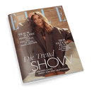 Titelbild der Zeitschrift „ELLE“ März 2025 mit einer brünetten Frau in einem oversized braunen Mantel vor warmer, weicher Hintergrundkulisse; Schlagzeilen u. a.: „Die Trend Show – Unsere Lieblings-Looks direkt von den Laufstegen“, „Traum Haare – Treatments, Peelings, Scalp Food – Die neuen Power-Wirkstoffe“, „Der Glücks-Plan – 6 Schritte zur inneren Freiheit“ sowie Hinweis auf ein Interview mit Lady Gaga.