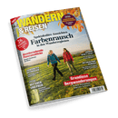 Titelbild der Zeitschrift „Wandern & Reisen“ (Ausgabe 04/24, Herbst) mit zwei wandernden weiblichen Personen auf einem grünen Feld vor Landschaftshintergrund, Titelschlagzeilen u. a.: „Farbenrausch in den Wanderregionen“, „26 Reiseziele“, „Grandiose Bergwanderungen in den Dolomiten und der Schweiz“, „Zauberhafter Natururlaub“ sowie ein abgebildeter gelber Wanderrucksack unten links.