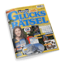 Titelbild der Zeitschrift „Bastei Glücks-Rätsel“, Ausgabe Nr. 6/24 für November/Dezember, mit gelbem Hintergrund und großem blauen Schriftzug; zentrale Abbildungen: lachende weiblich gelesene Person mit braunen Haaren, Buchcover mit Titeln „Merry Christmas, Poppy“ und „Ein Hauch von Wintermagie“, ein Adventskalender, ein Schmuck-Set, ein Frühstücks-Set, eine verschneite Berglandschaft mit „Urlaub“-Beschriftung, ein ausgefüllter Rätselblock, mehrere Werbetexte, u. a. „GARANTIERT 120 Rätsel“.