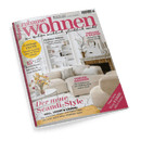 Titelbild der Wohnzeitschrift „zuhause wohnen“, Ausgabe Nr. 3 März 2025; mittig ein beigefarbenes Wohnzimmer mit hellen Möbeln, runder Couchtisch mit Blumenstrauß, Kamin mit Dekor und weißem Regal im Hintergrund; Aufschriften u.a.: „Der neue Scandi-Style“, „15 bezahlbare Design-Couchtische“, „Frühlings-Trend“, „Perfekter Stilmix“, „Vorher-Nachher: Ein Schlafzimmer mit Wellness-Bad unterm Dach“ sowie „Was FARBE alles kann“ in pinkem Balken unten rechts.