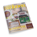 Titelblatt der Wohnzeitschrift „zuhause wohnen“, Ausgabe Mai 2026. Im Zentrum ein Küchenszene‑Motiv mit grünem Gasherd, Holzarbeitsplatte und Vase mit lila Blumen. Texte auf dem Cover: „Die schönsten Sideboards“, „Perfekt gepflegt“, „Lust auf Romantik“, „Panorama‑Reisen“, „Plus: Sommer‑Fest“ und ein gelbes Feld mit „Zu gewinnen – Unvergessliche Tage in eigener Villa im Wert von 5.000 Euro“. Farbtöne in Grün, Rosa, Holzbraun und Gelb‑Orange.