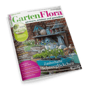 Titelbild der Zeitschrift „GartenFlora“ vom Februar 2025 mit dem Untertitel „gärtnern, erleben und genießen“, zentrale Fotografie zeigt ein Regal mit Blumentöpfen, Gartengeräten und Schneeglöckchen vor einer roten Backsteinwand, hervorgehobene Texte: „Zauberhafte Schneeglöckchen“, „Weidenflechten“, „Klimawandel – GARTENwandel“, „Gold im Winter: Gelbnadelige Koniferen“, „Experimentell: Soja-Anbau im Garten“ sowie ein violetter Infoblock mit weiteren Gartenthemen.