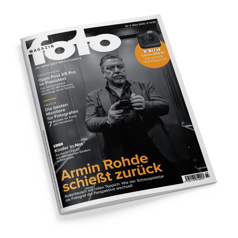 Titelbild der Zeitschrift „FotoMAGAZIN“ Nr. 3 vom März 2025, mit einem schwarz-weiß Porträt eines älteren männlichen Fotografen mit Bart und Kamera in den Händen; orangefarbene Titelzeile: „Armin Rohde schießt zurück“, darüber Rubriken: „OPPO Find X8 Pro im Praxistest“, „Die besten Monitore für Fotografen“, „Kinder in Not“ und ein orangefarbenes Test-Label oben rechts: „Canon EOS R1 – Das schnelle Profi-Flaggschiff“.