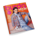 Titelbild der Zeitschrift „burda style“ Ausgabe 4/2025 mit einer sitzenden weiblich gelesenen Person in einem bunten, grob strukturierten Jackenoberteil in Blau, Orange und Rosa über einer hellblauen Bluse und blauer Hose, vor orange-pinkem Hintergrund. Schlagzeilen u. a.: „Wow, DIESE FARBEN!“, „MUST-HAVE: EIN 70s KLEID“, „FEINHEIT: Edel-Ethno mit grafischen Prints und luftigen Silhouetten“, pinker Kreis mit weißer Aufschrift „burda wird 75 Jahre“.