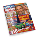 Schräg fotografiertes, farbig bedrucktes Magazin „GLÜCKS REVUE“ mit glänzender Oberfläche auf schwarzem Hintergrund. Auf dem Cover sind ein männliches Porträt im Vordergrund und eine weibliche Person dahinter abgebildet, dazu die Texte „EXTRA-RÄTSELHEFT“, „35x Ratespaß“, „JÜRGEN KLOPP – Lügen & Intrigen“, „Rezepte zum Schlemmen“, „Diabetes-Risiko“ und „Die besten Spar-Tipps“.